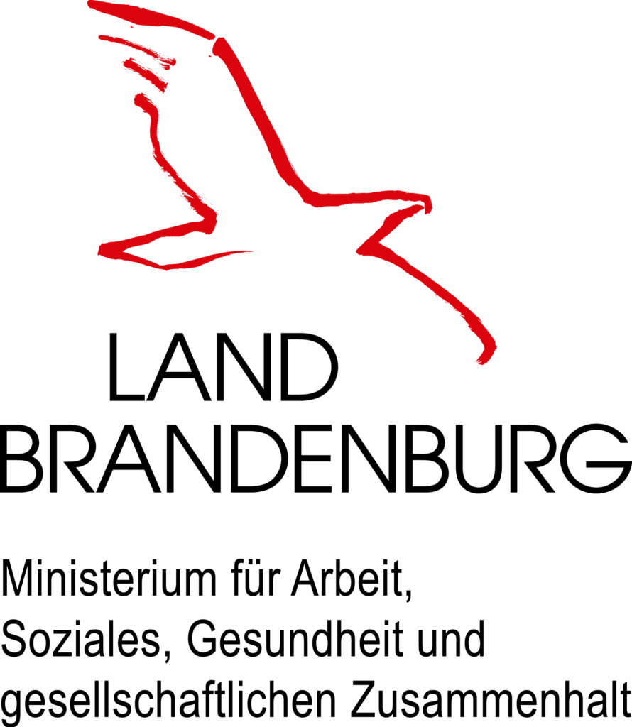 Ein rotes MASGZ-Logo erscheint als stilisierte Liniengrafik auf schwarzem Hintergrund und verweist auf das Ministerium für Arbeit, Soziales, Gesundheit und gesellschaftlichen Zusammenhalt.