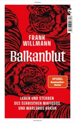 Das rot-schwarze Buchcover zeigt „Balkanblut“ von Frank Willmann, drei Tierköpfe und „Spiegel-Bestseller-Autor“.
