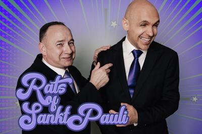Zwei Männer im Anzug stehen vor violettem Sternenhintergrund, unten links ist der Schriftzug „Rats of Sankt Pauli“ zu sehen.