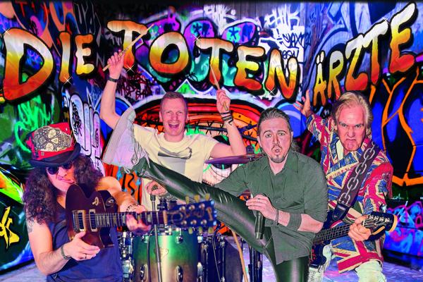 Vor greller Graffiti-Wand spielt Slash mit DIE TOTEN ÄRZTE ein energiegeladenes Punkrock-Set, begleitet von Gitarre, Schlagzeug und knalligen Farben.